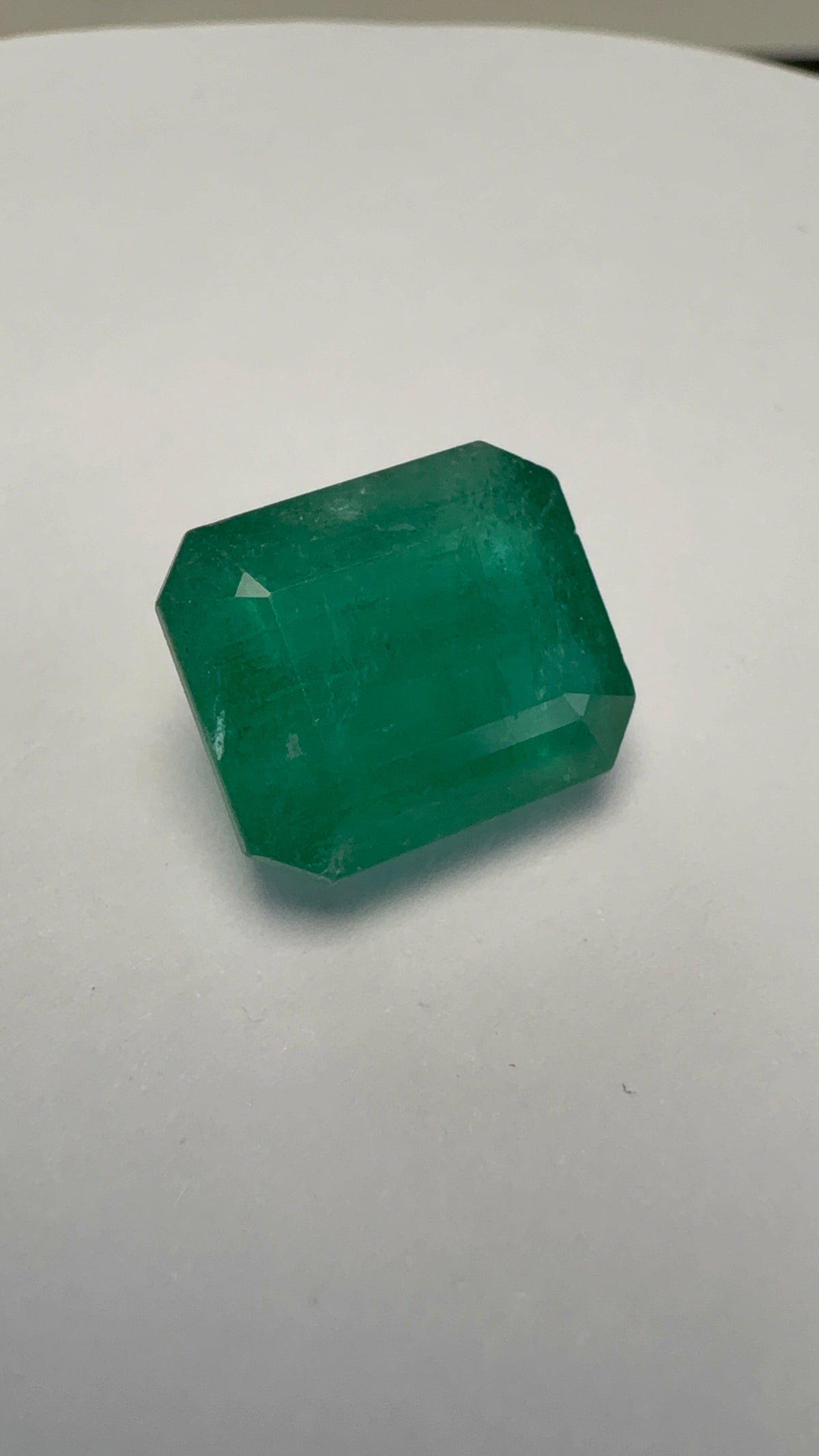 Emerald 6.43 carat EMER-111 alternate face-up view