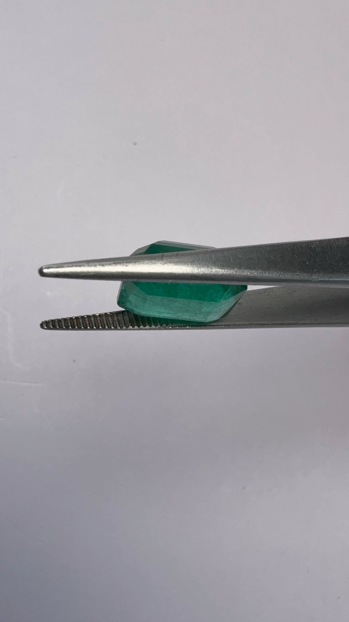 Emerald 6.43 carat EMER-111 angled view