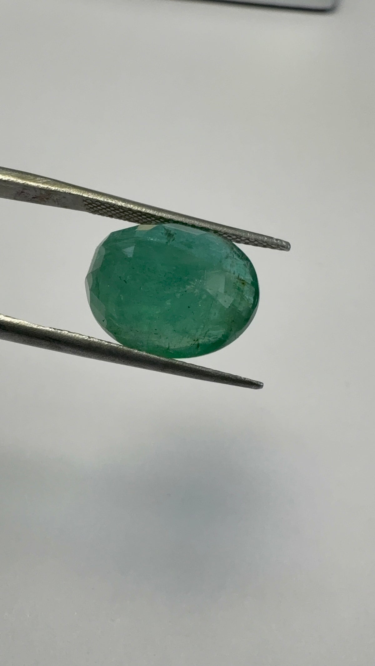 Emerald 10.17 carat EMER-119 angled view