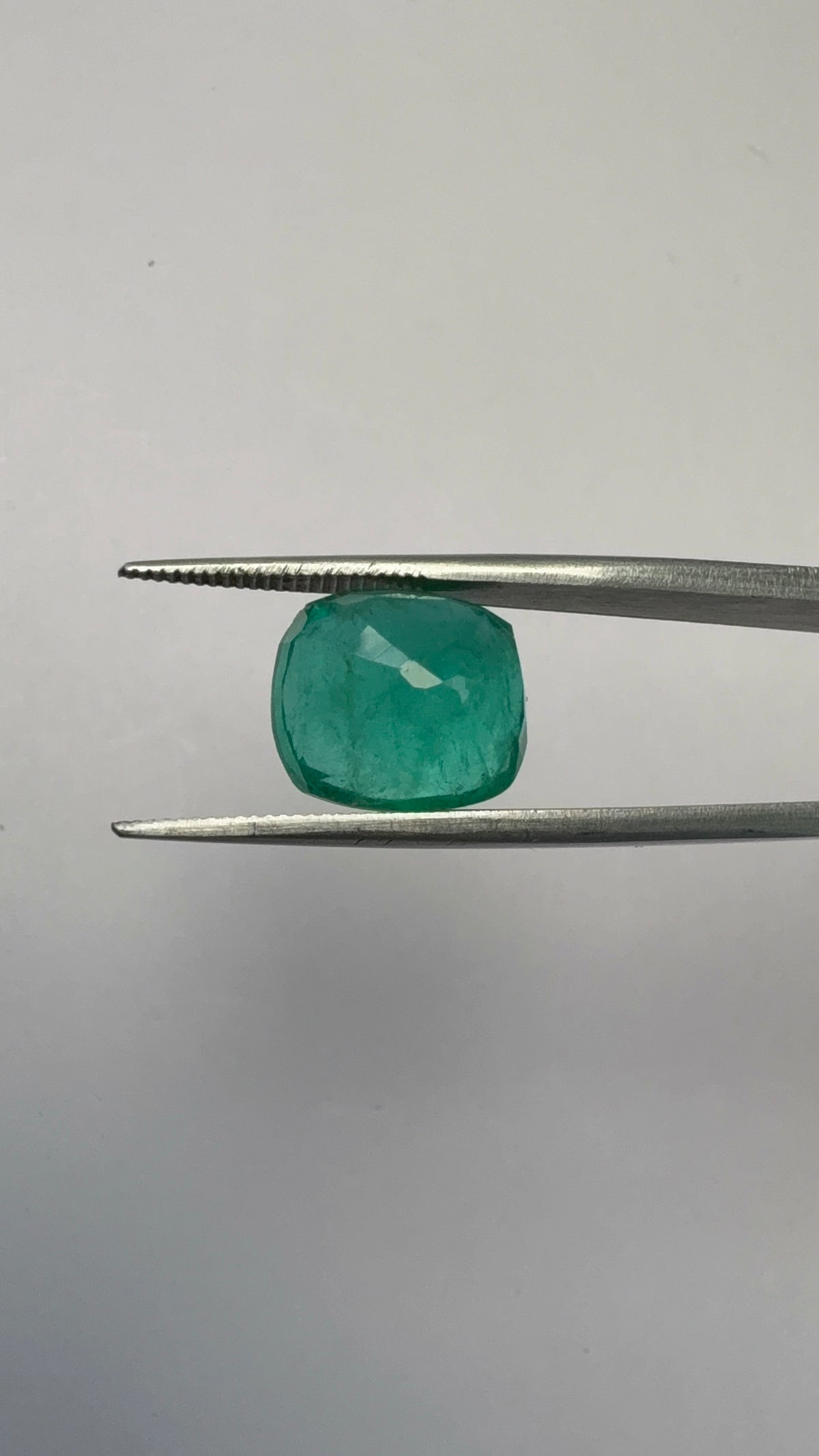 Emerald 6.47 carat EMER-12 angled view