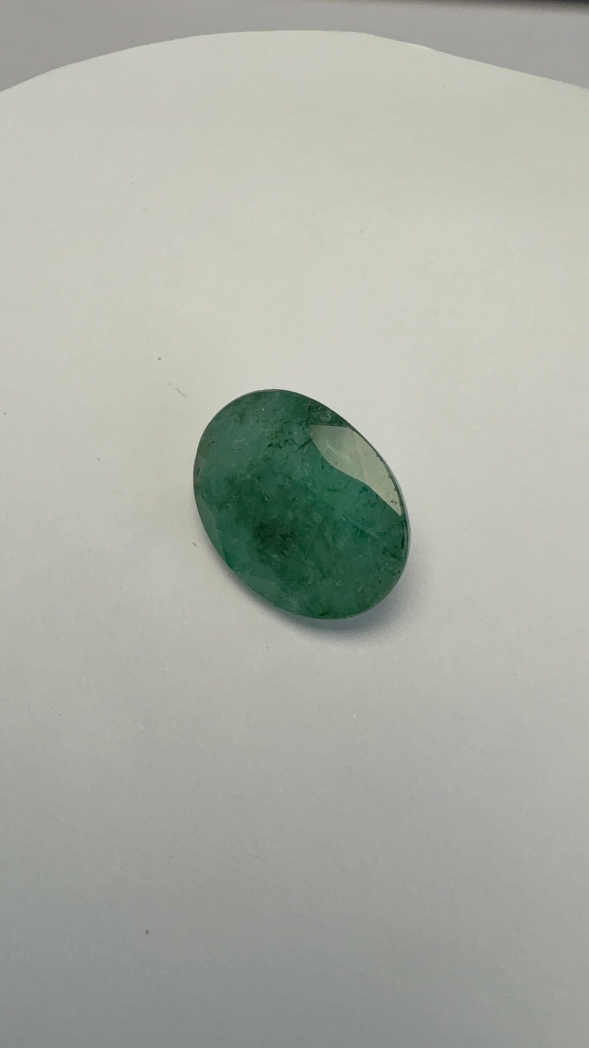 Emerald 8.28 carat EMER-122 alternate face-up view