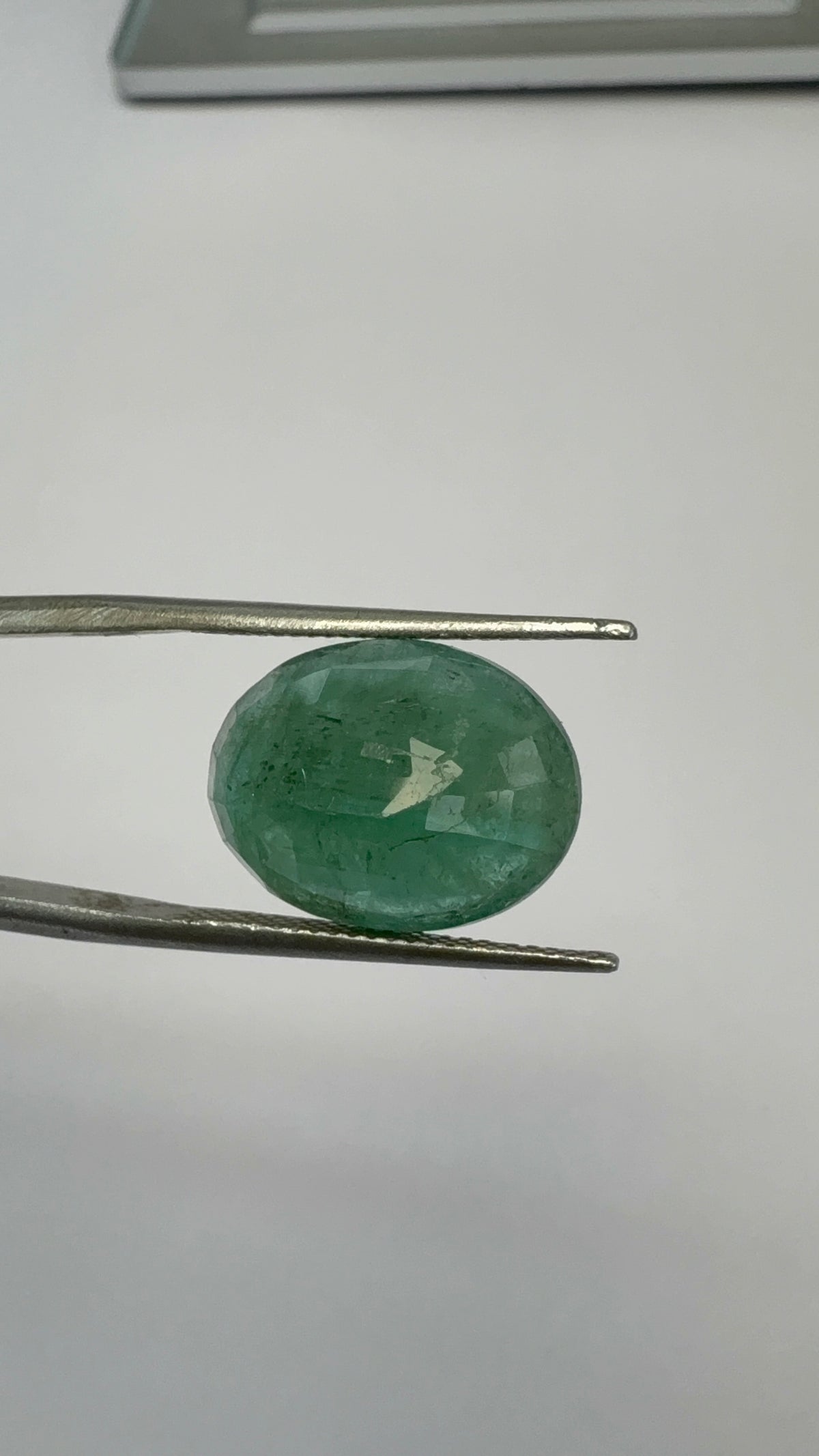 Emerald 8.28 carat EMER-122 angled view