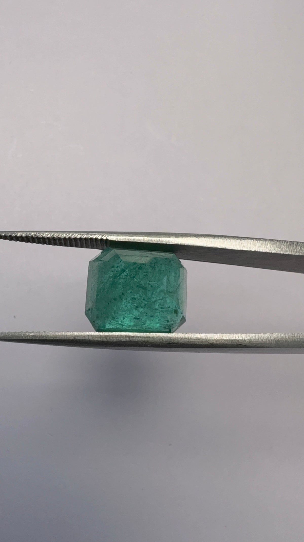 Emerald 7.72 carat EMER-125 angled view