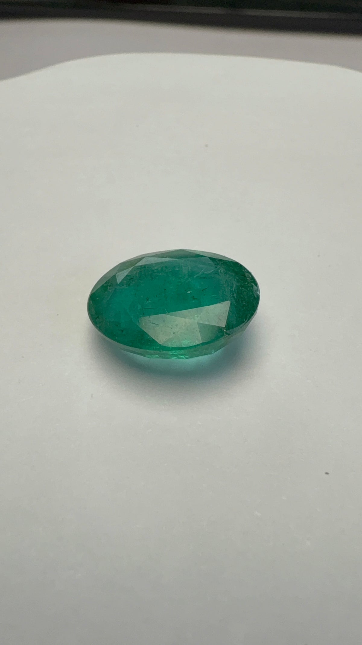 Emerald 5.72 carat EMER-126 alternate face-up view