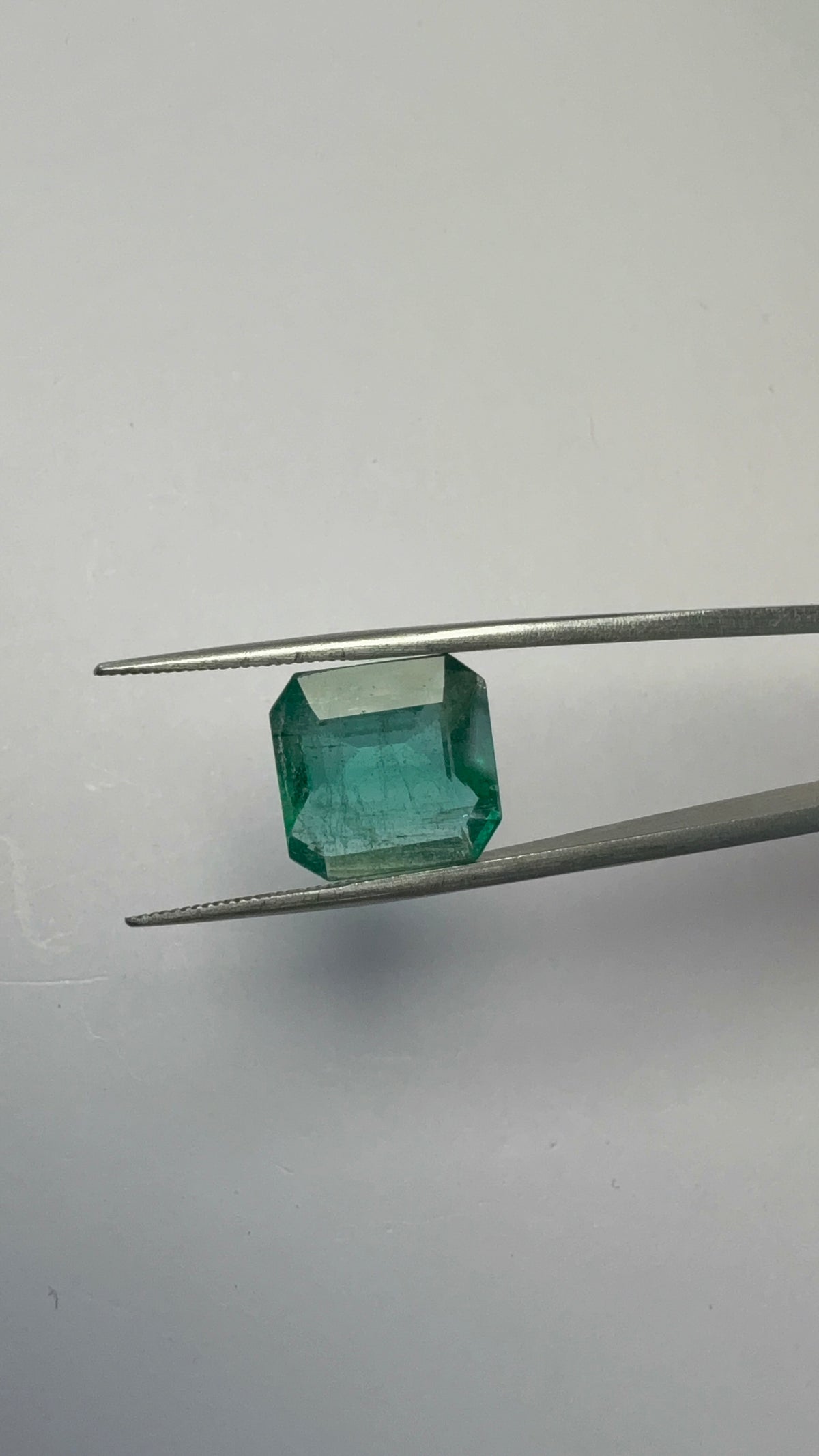 Emerald 6.74 carat EMER-127 angled view