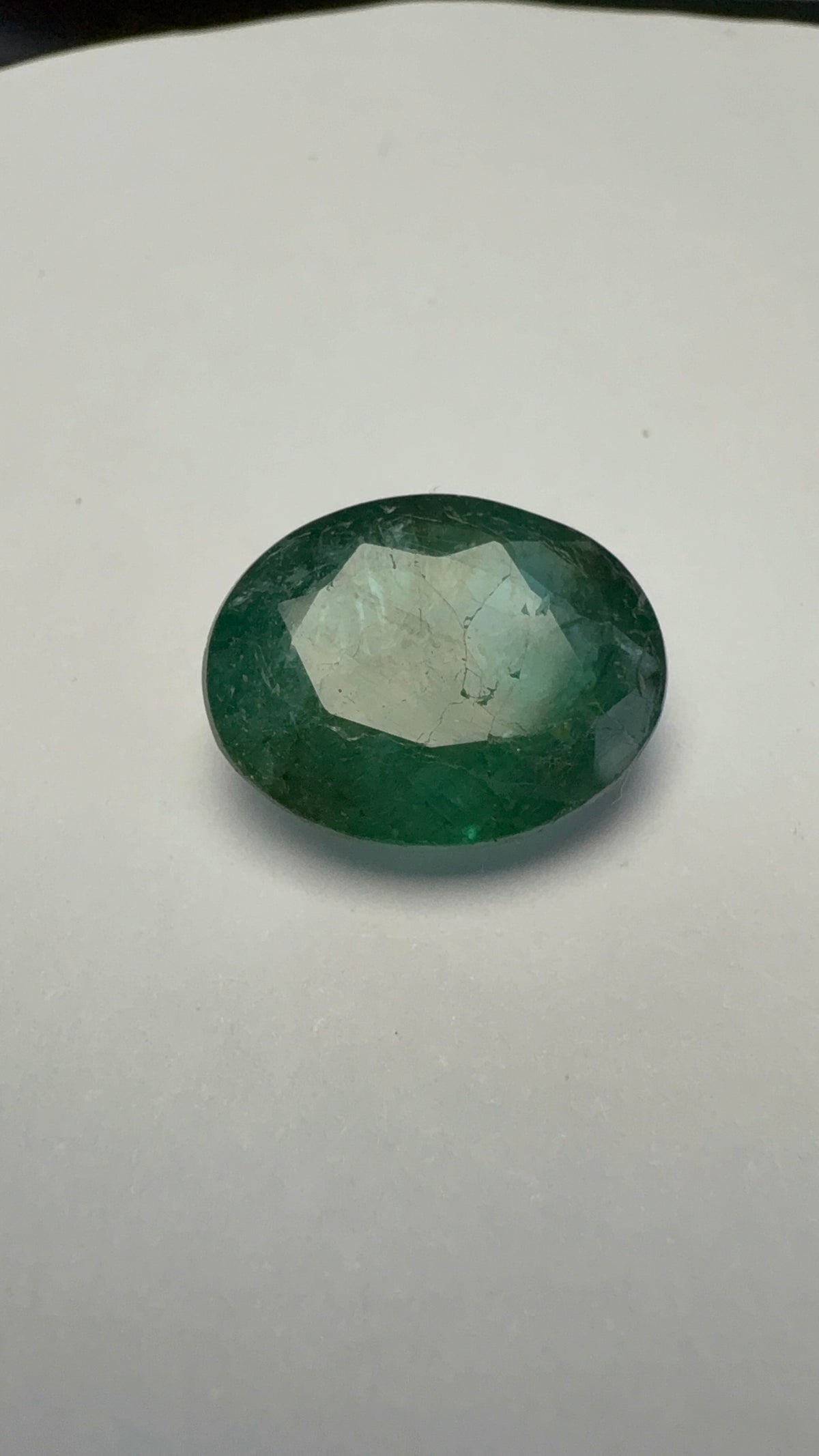 Emerald 5.66 carat EMER-13 alternate face-up view