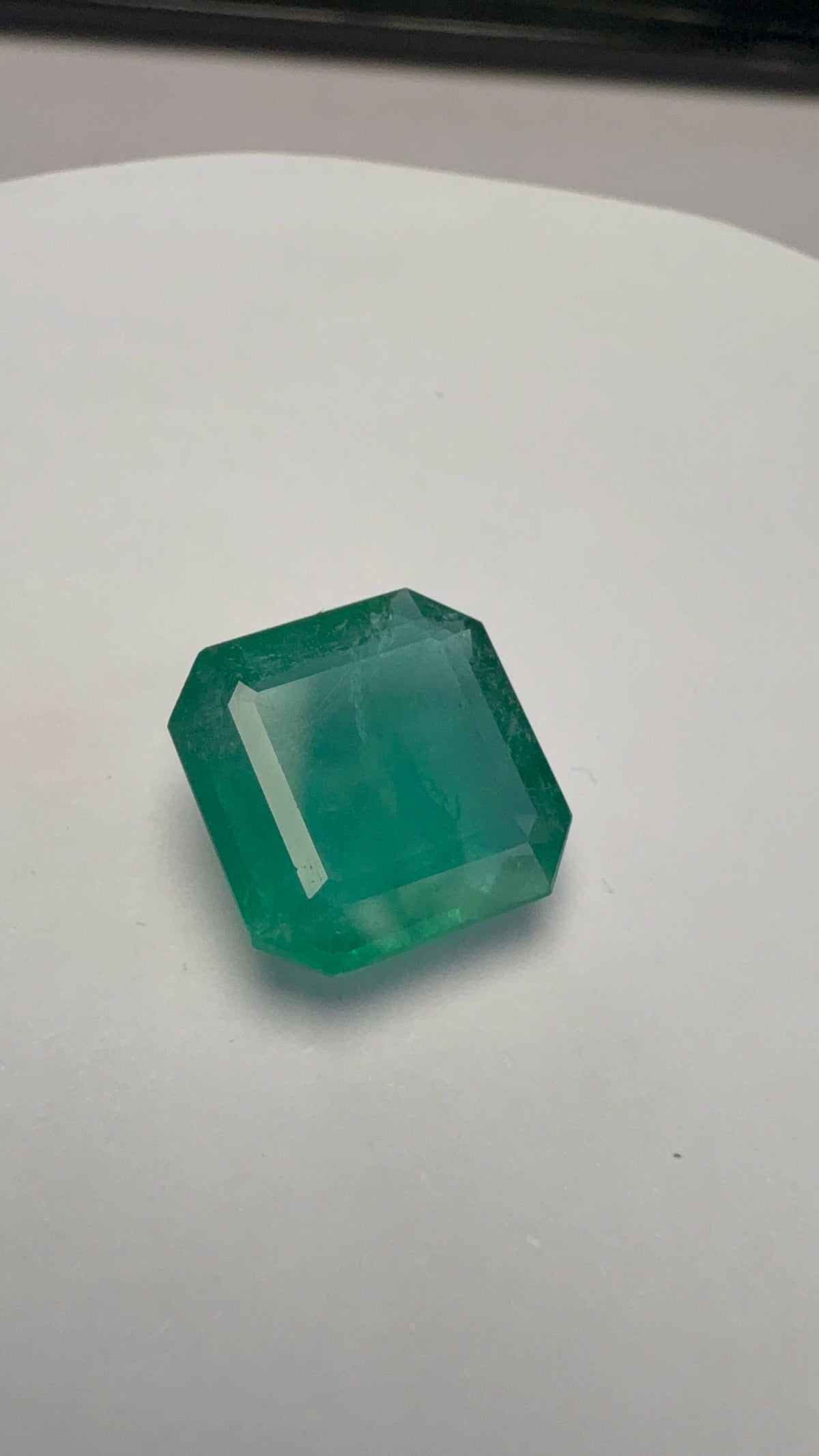 Emerald 7.94 carat EMER-131 alternate face-up view