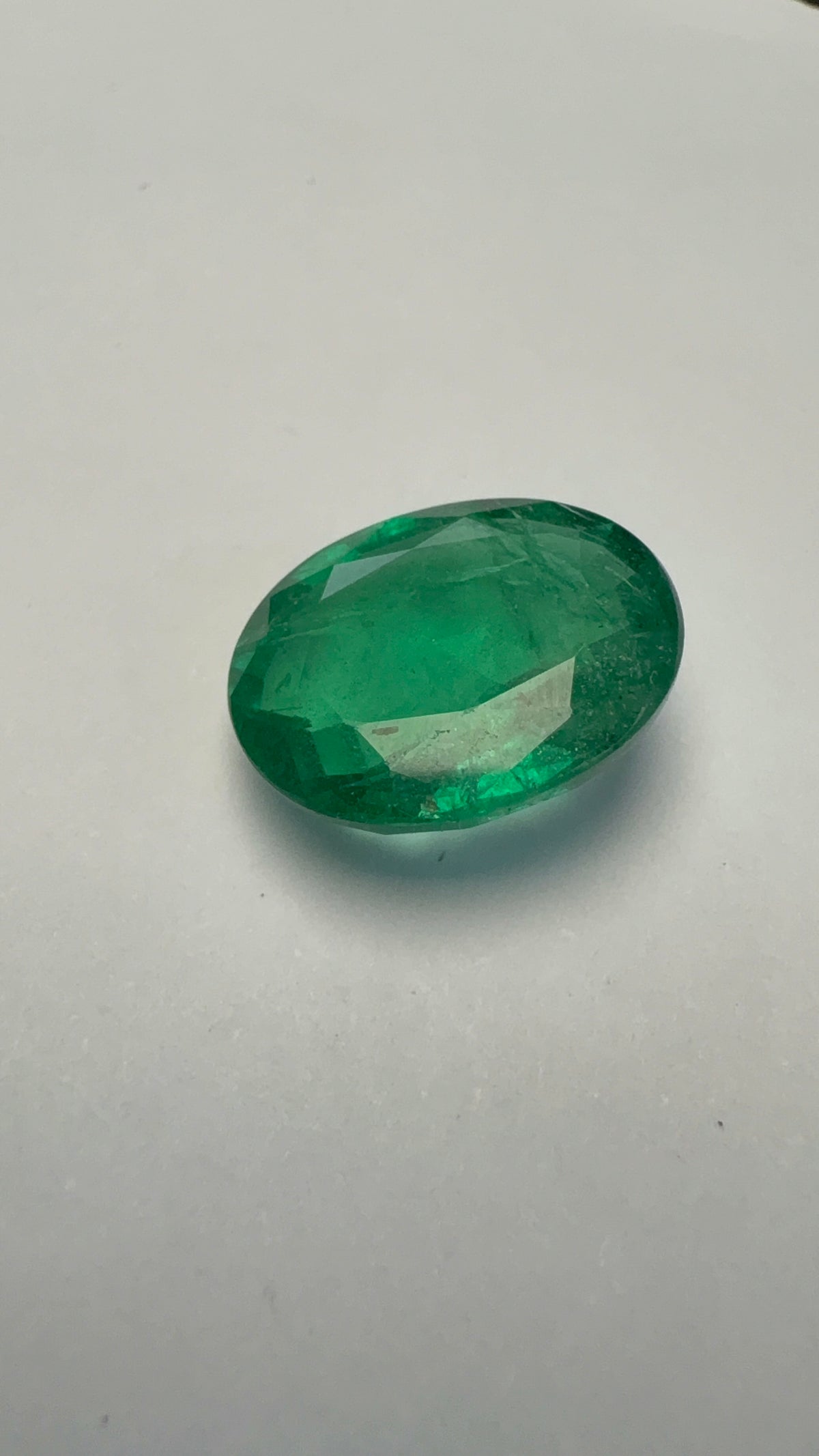 Emerald 5.77 carat EMER-141 alternate face-up view