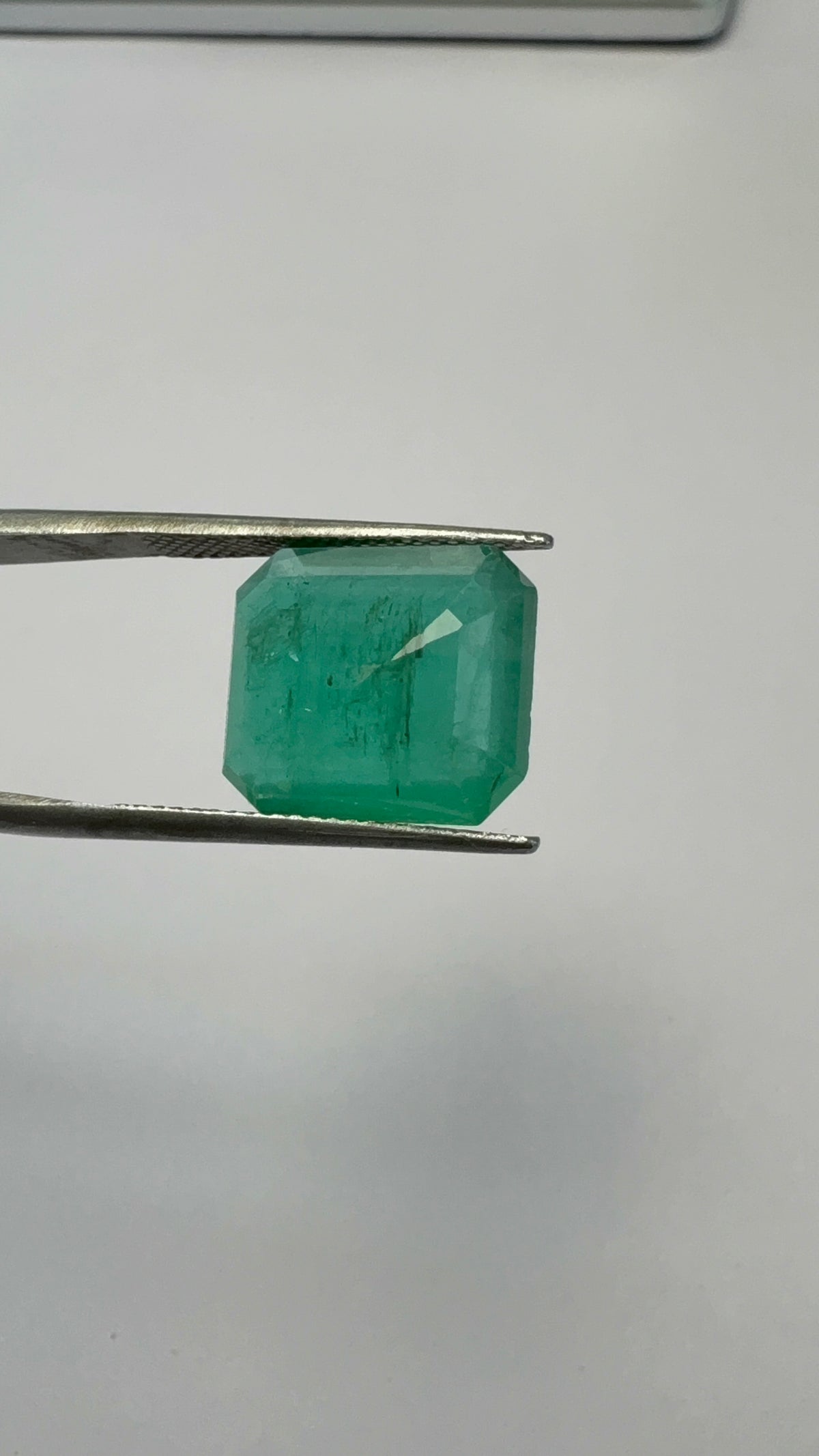 Emerald 8.60 carat EMER-16 side view