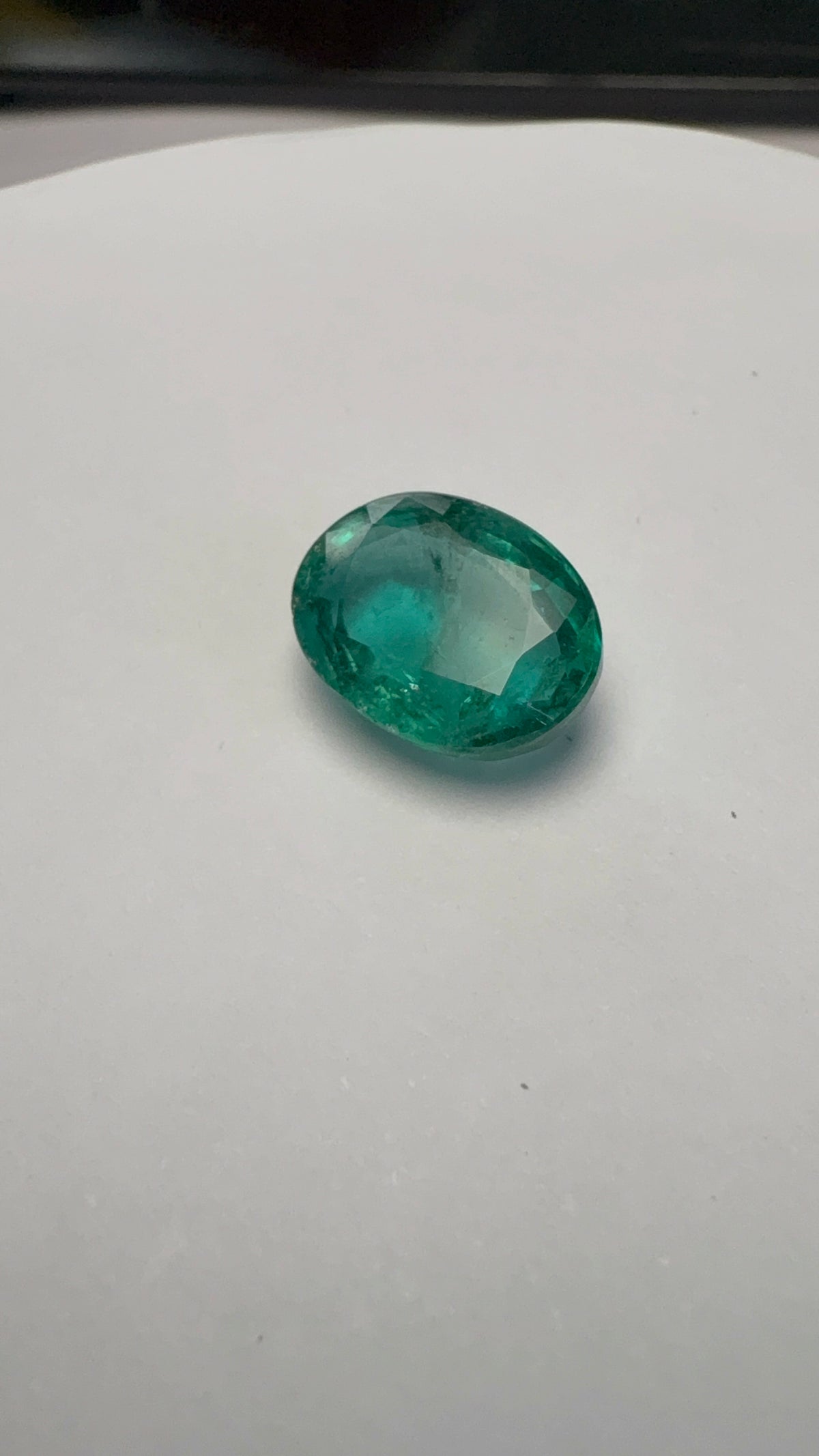 Emerald 5.24 carat EMER-174 alternate face-up view