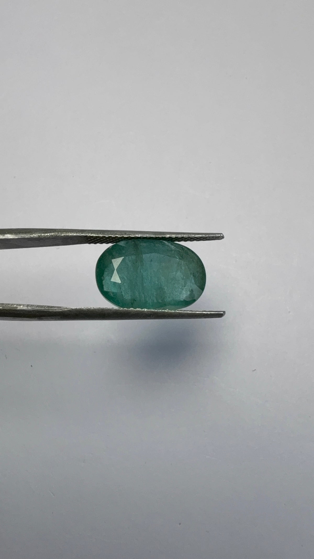 Emerald 5.57 carat EMER-21 alternate face-up view