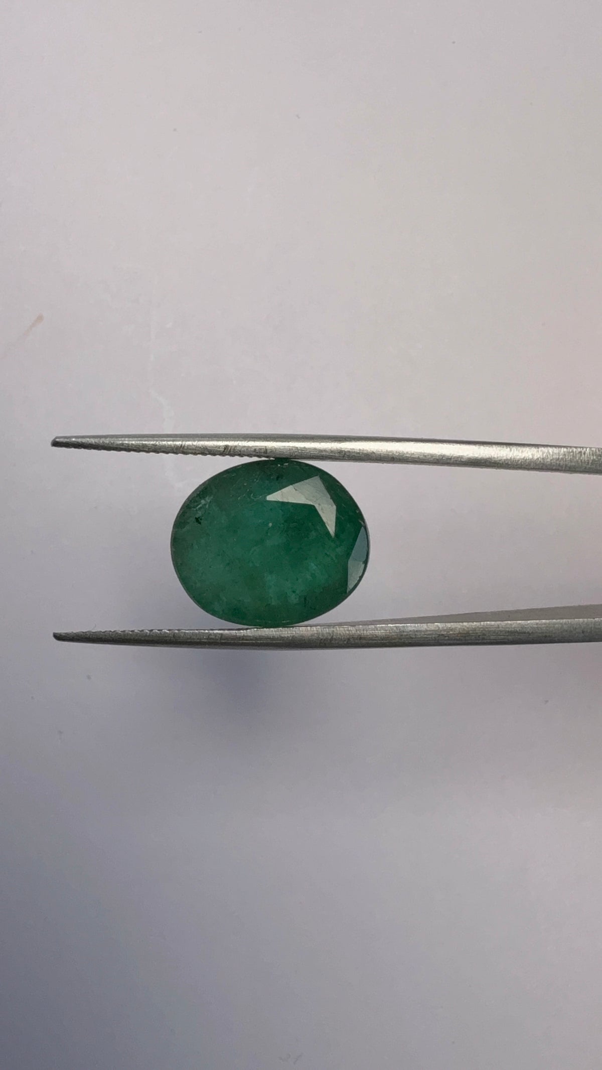 Emerald 7.02 carat EMER-221 angled view