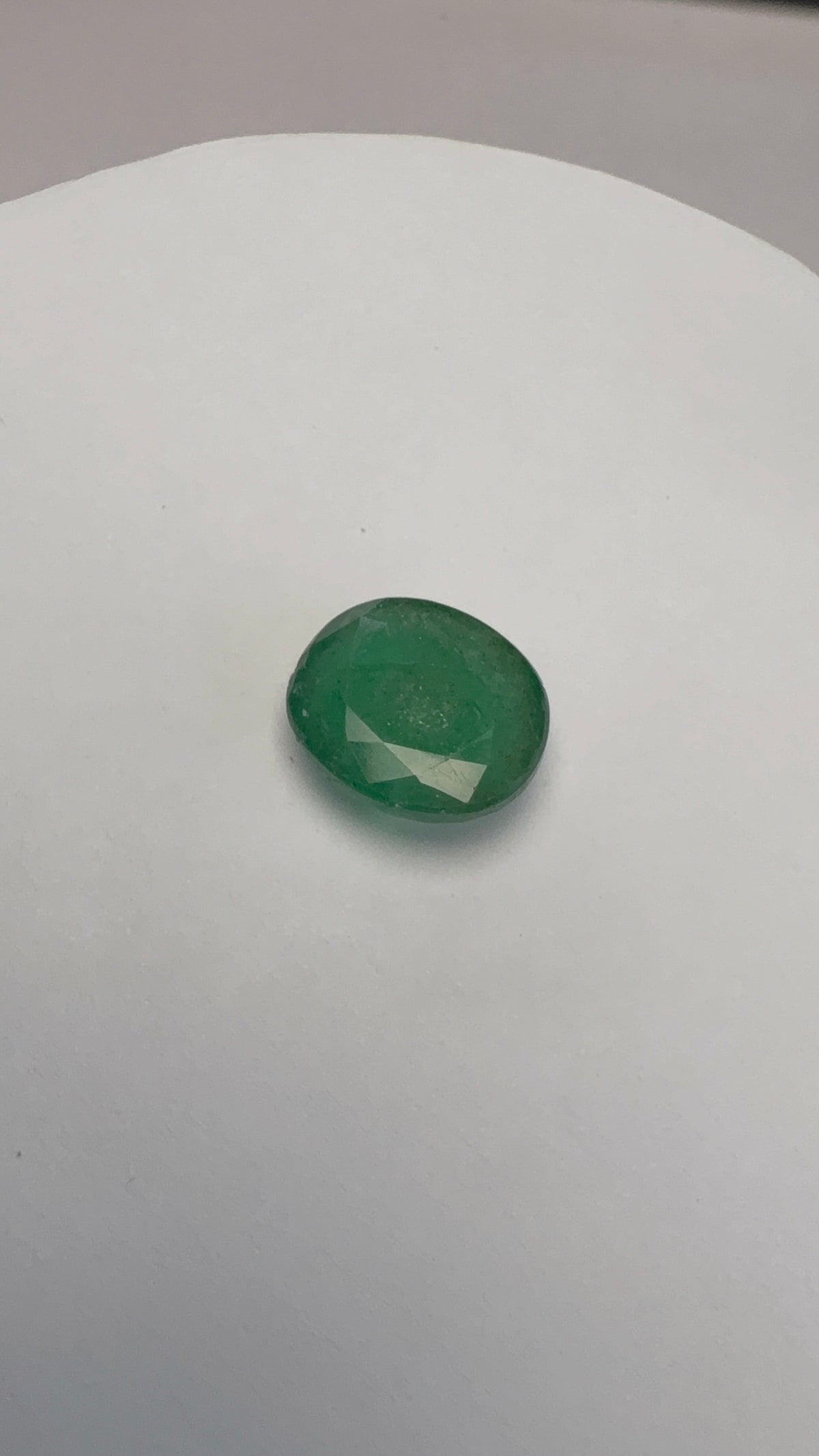 Emerald 7.55 carat EMER-223 alternate face-up view