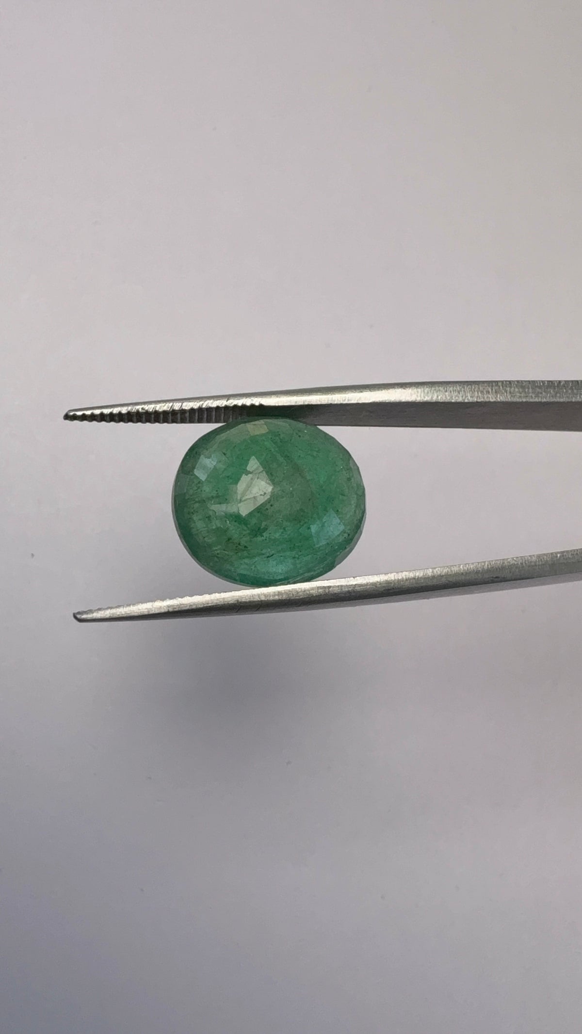 Emerald 7.55 carat EMER-223 angled view