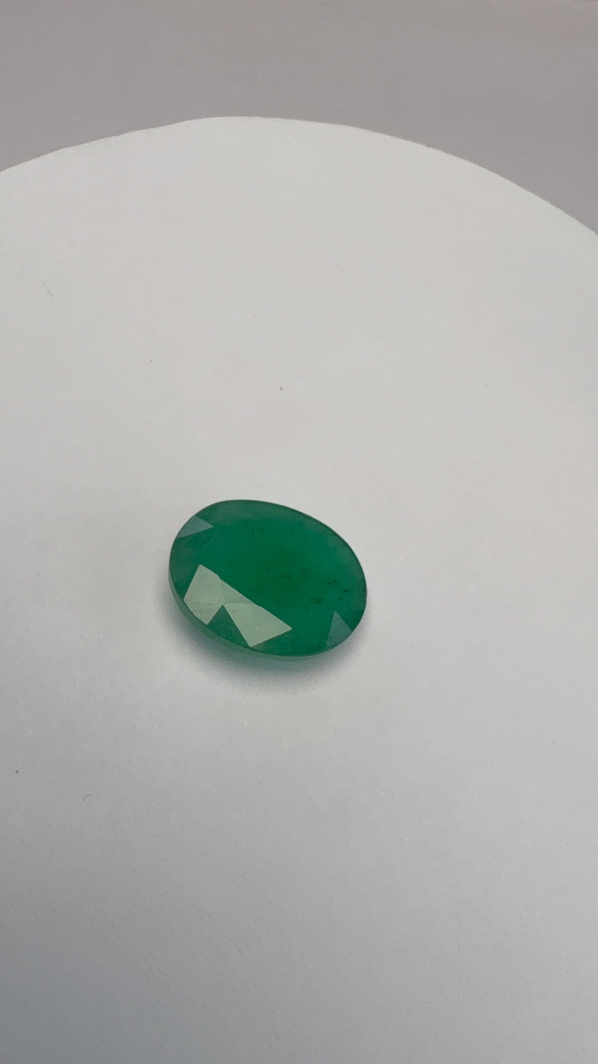 Emerald 7.75 carat EMER-27 alternate face-up view
