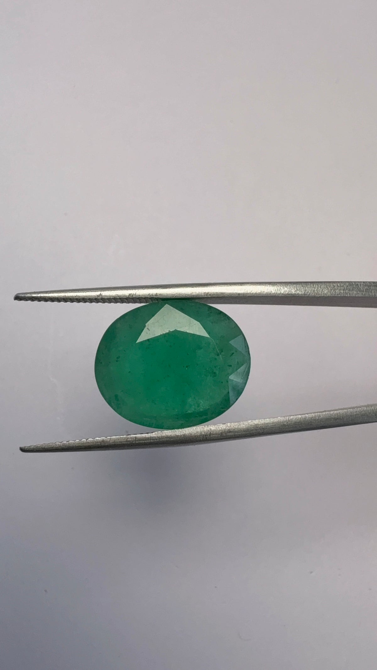 Emerald 7.75 carat EMER-27 angled view