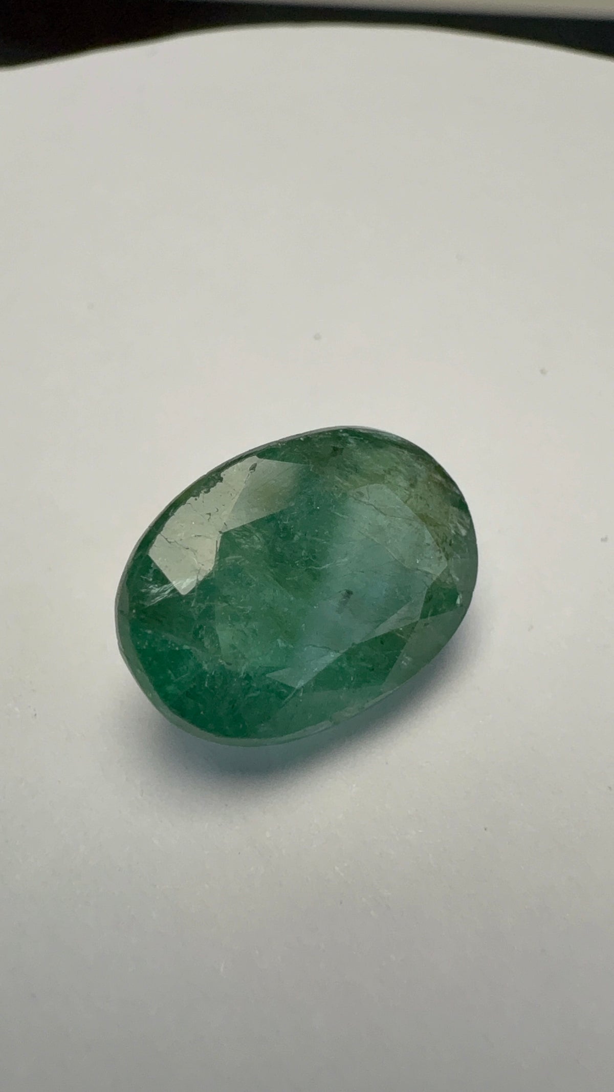 Emerald 5.69 carat EMER-36 alternate face-up view