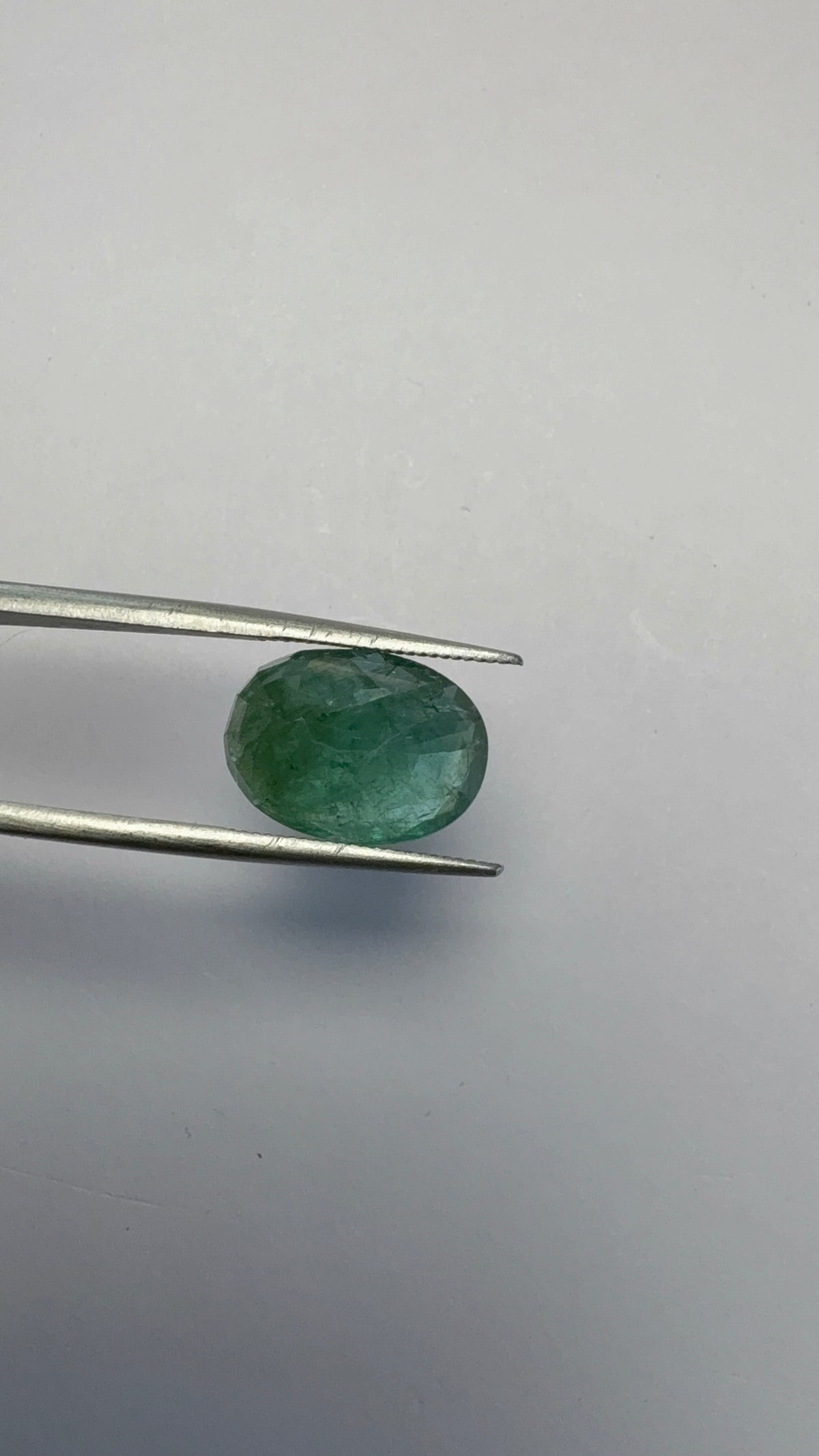Emerald 5.69 carat EMER-36 angled view