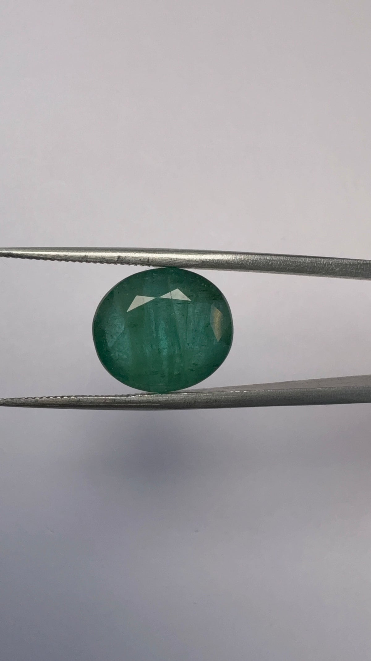 Emerald 7.69 carat EMER-39 angled view