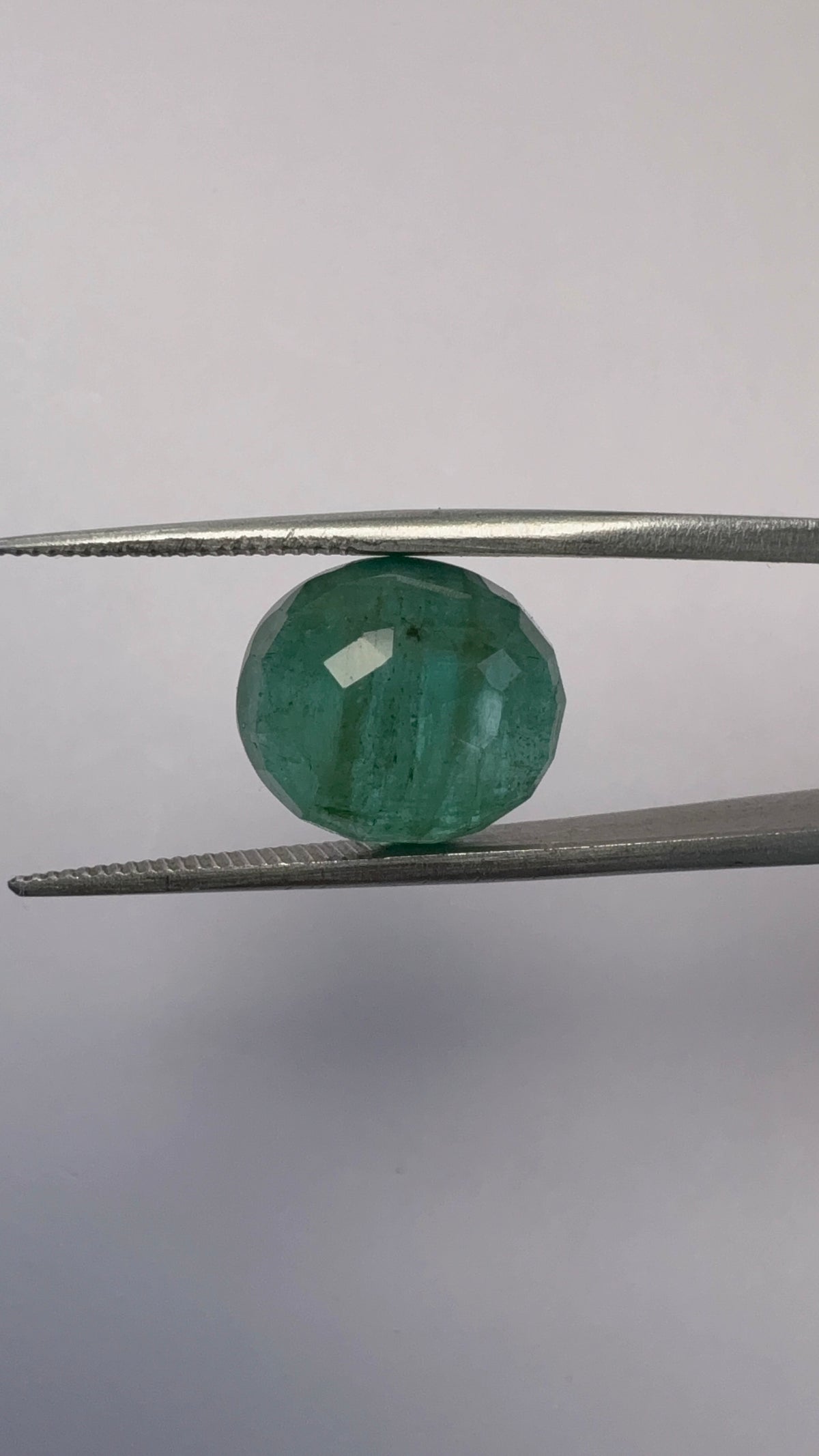 Emerald 7.69 carat EMER-39 reverse view