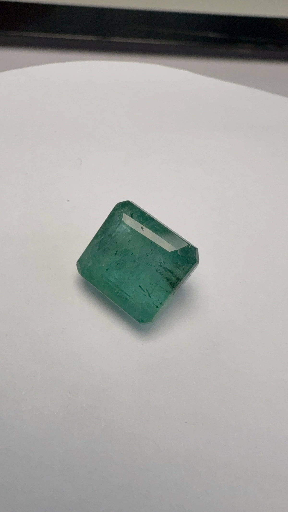 Emerald 8.27 carat EMER-41 alternate face-up view