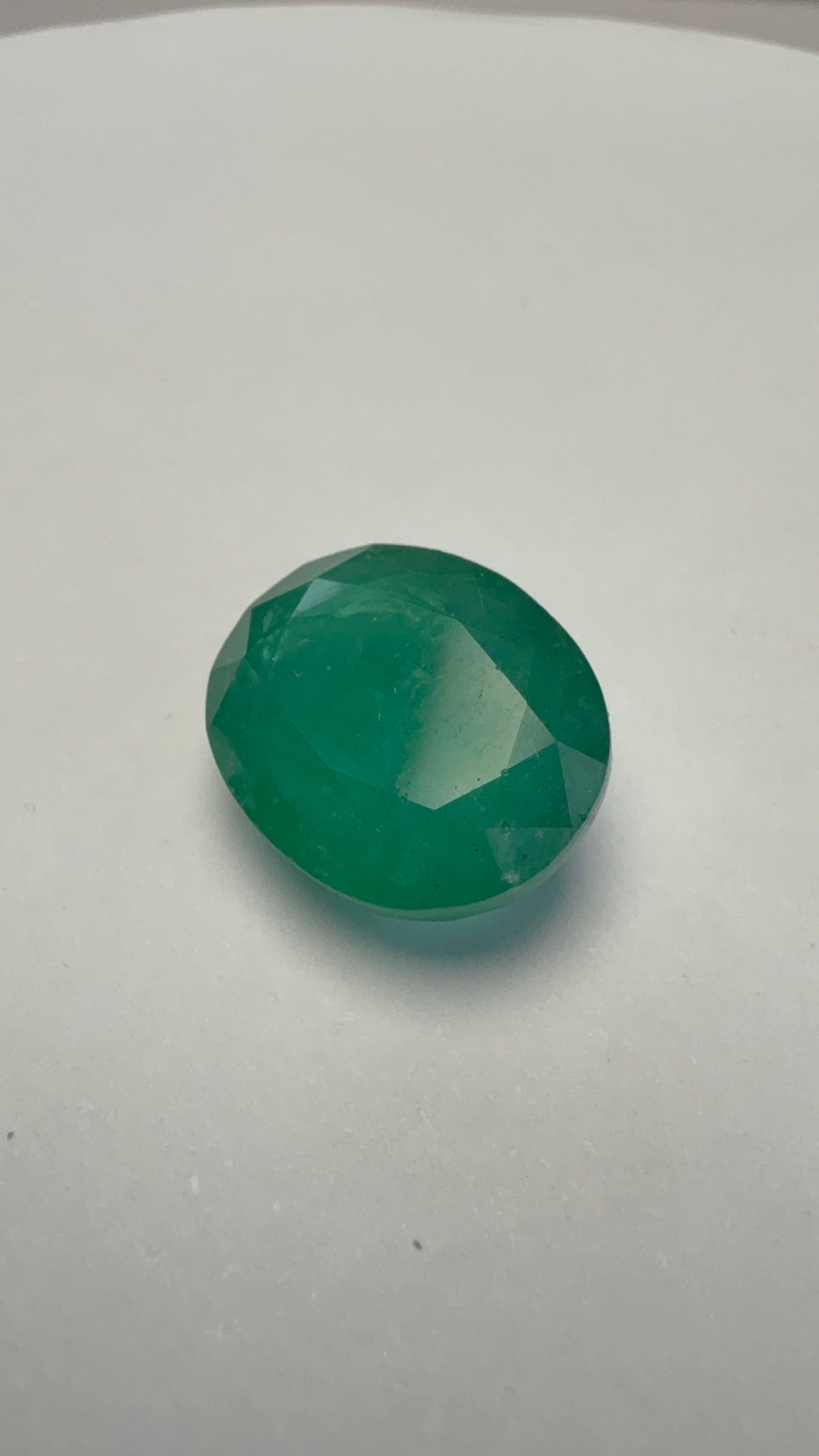 Emerald 5.73 carat EMER-44 alternate face-up view