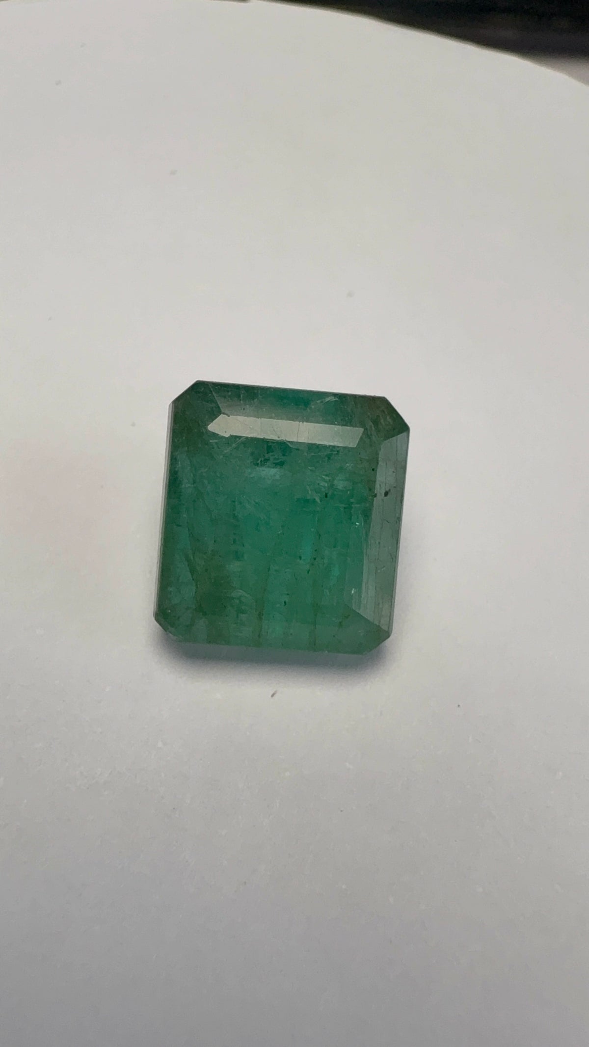 Emerald 6.76 carat EMER-64 face-up view