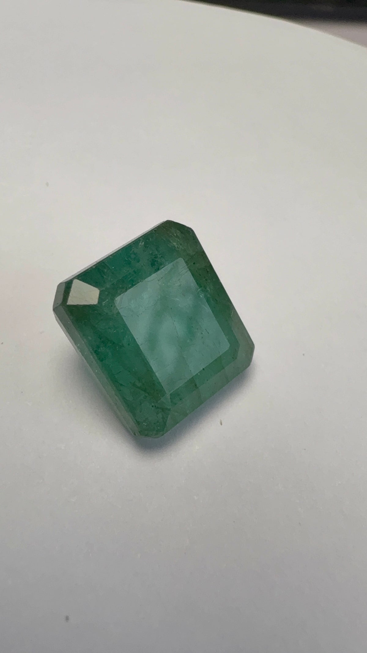 Emerald 6.76 carat EMER-64 angled view