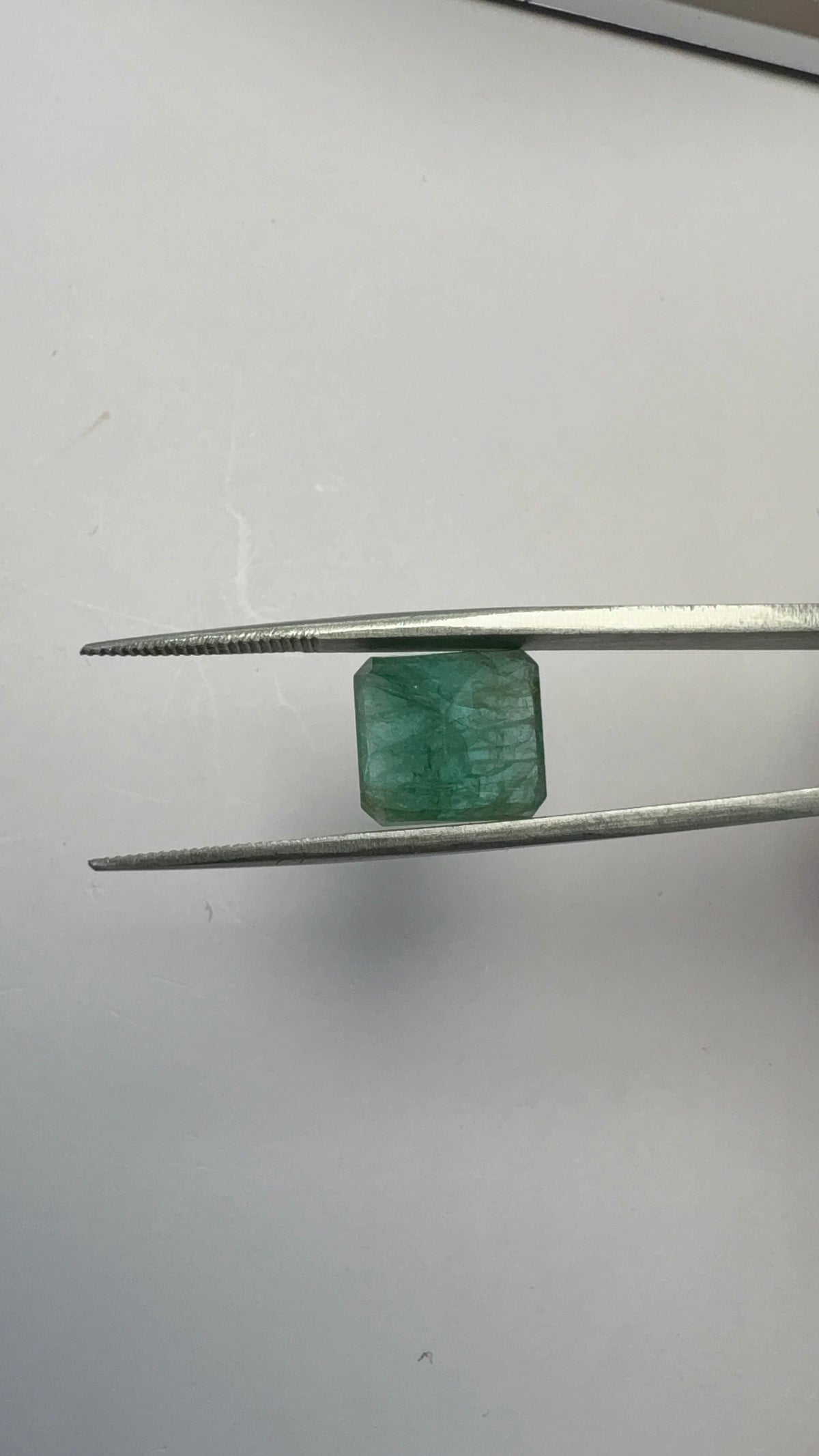 Emerald 6.76 carat EMER-64 side view