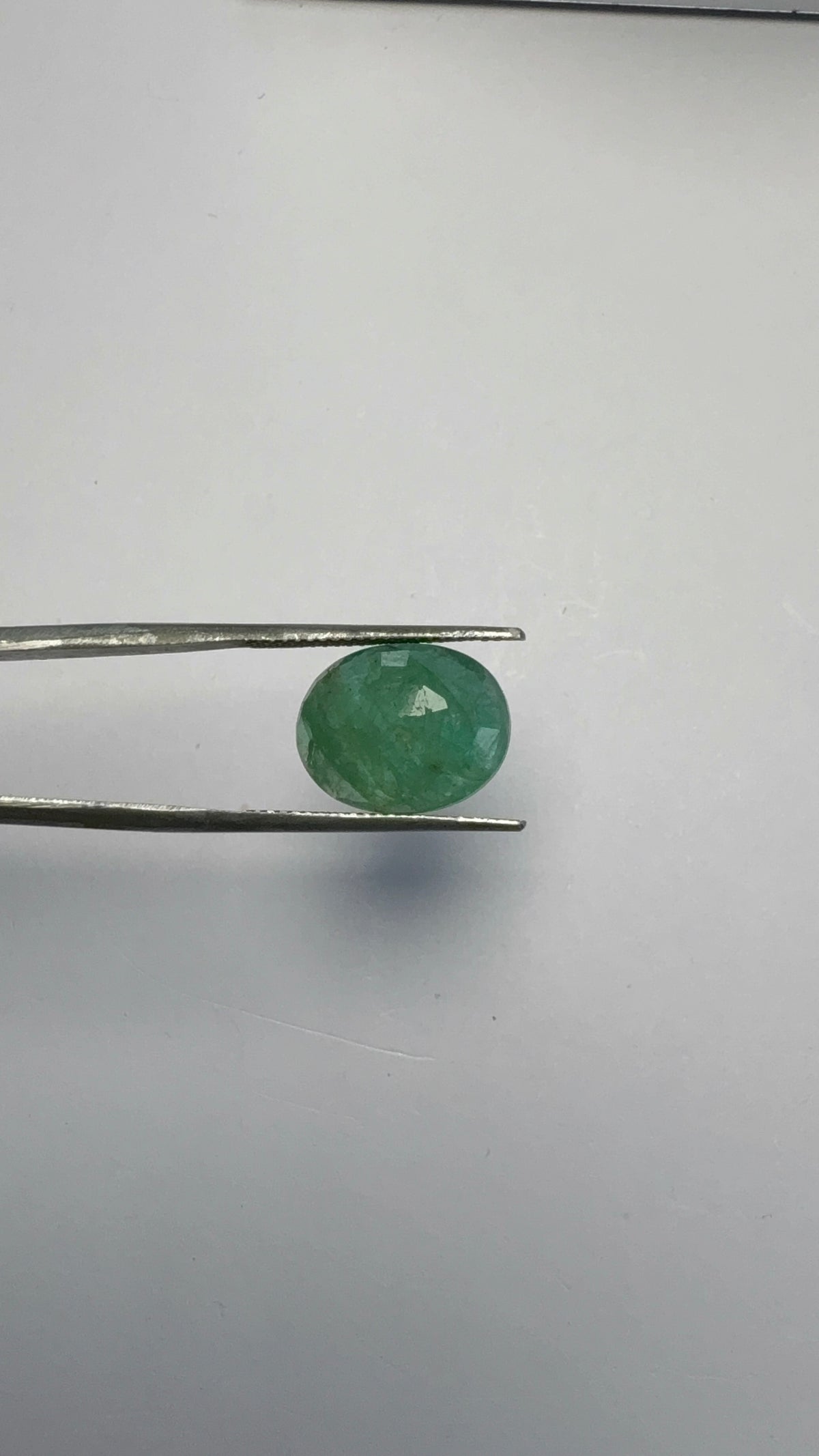 Emerald 5.64 carat EMER-66 angled view