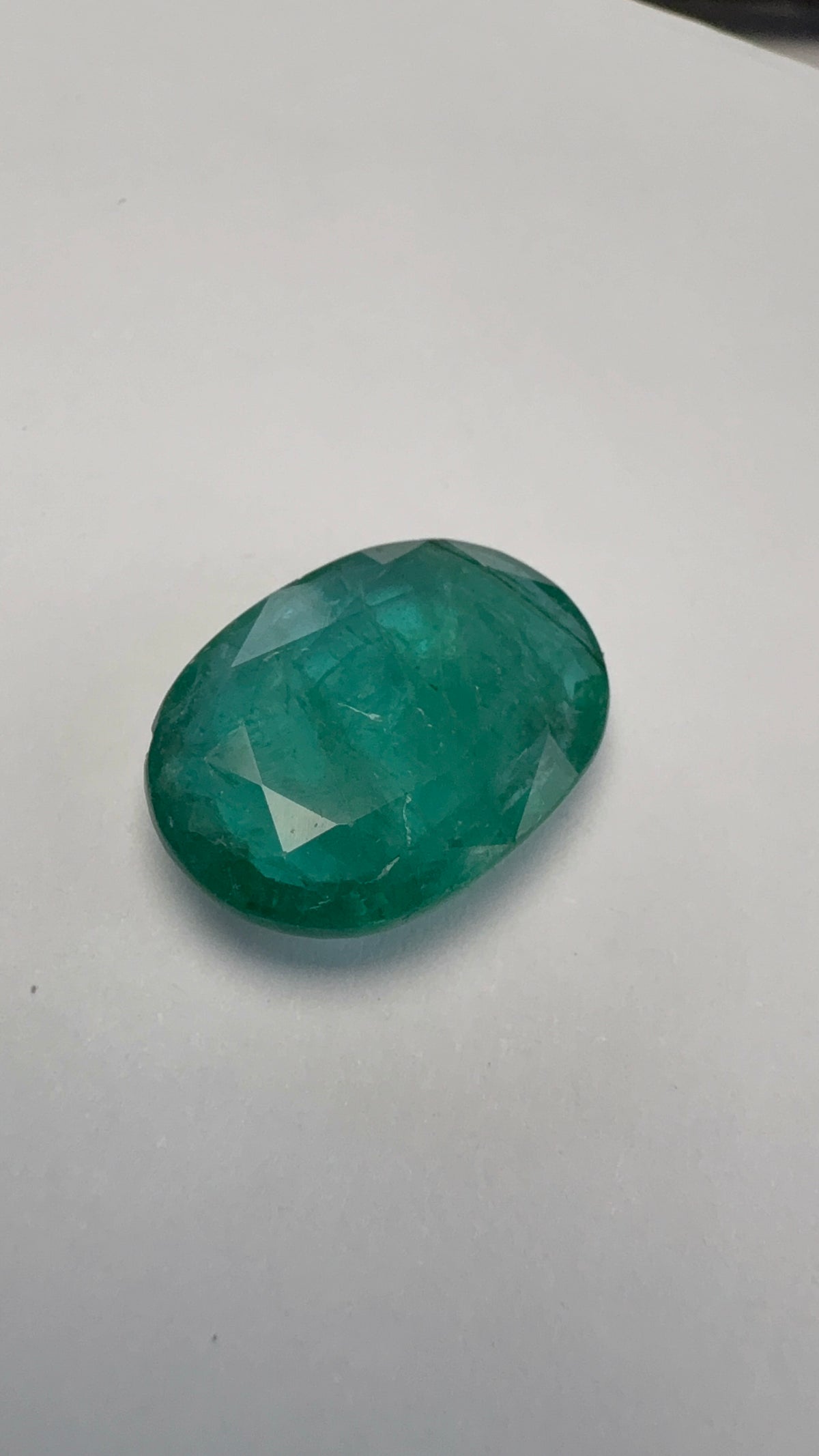 Emerald 7.80 carat EMER-84 alternate face-up view