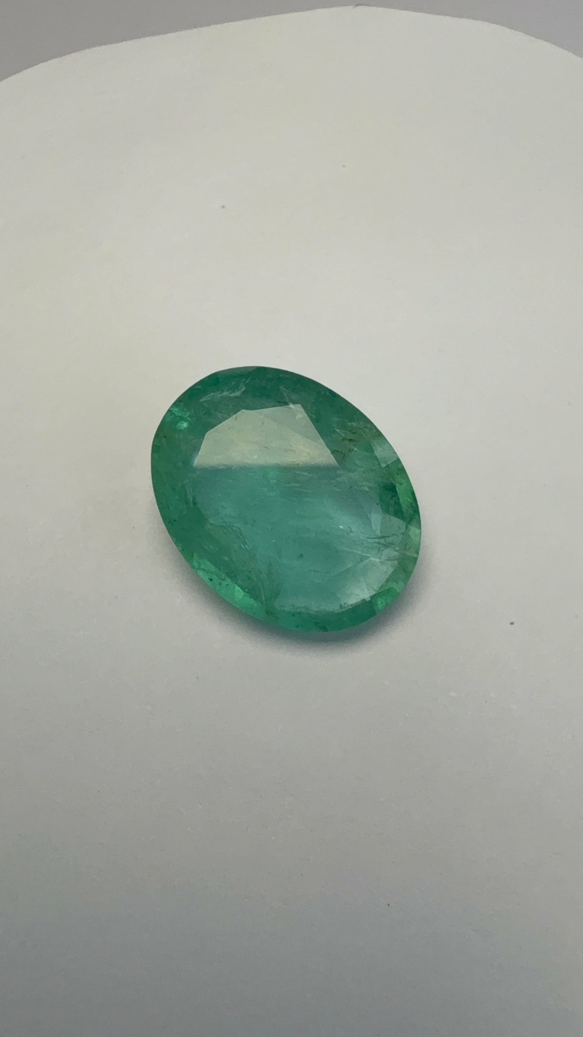 Emerald 11.68 carat EMER-96 alternate face-up view