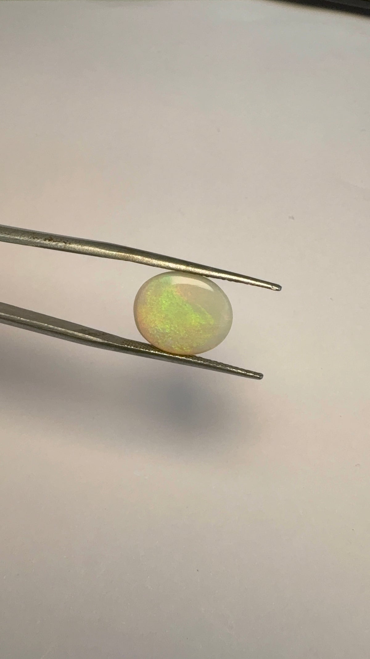 Opal 4.15 carat OPR-3 alternate face-up view