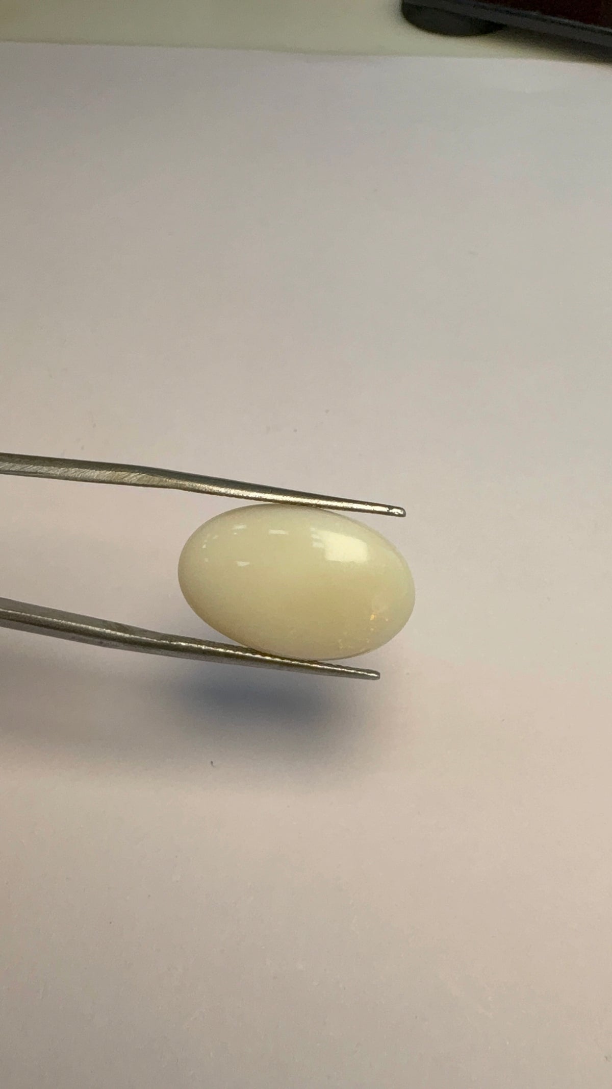 Opal 6.87 carat OPR-33 alternate face-up view