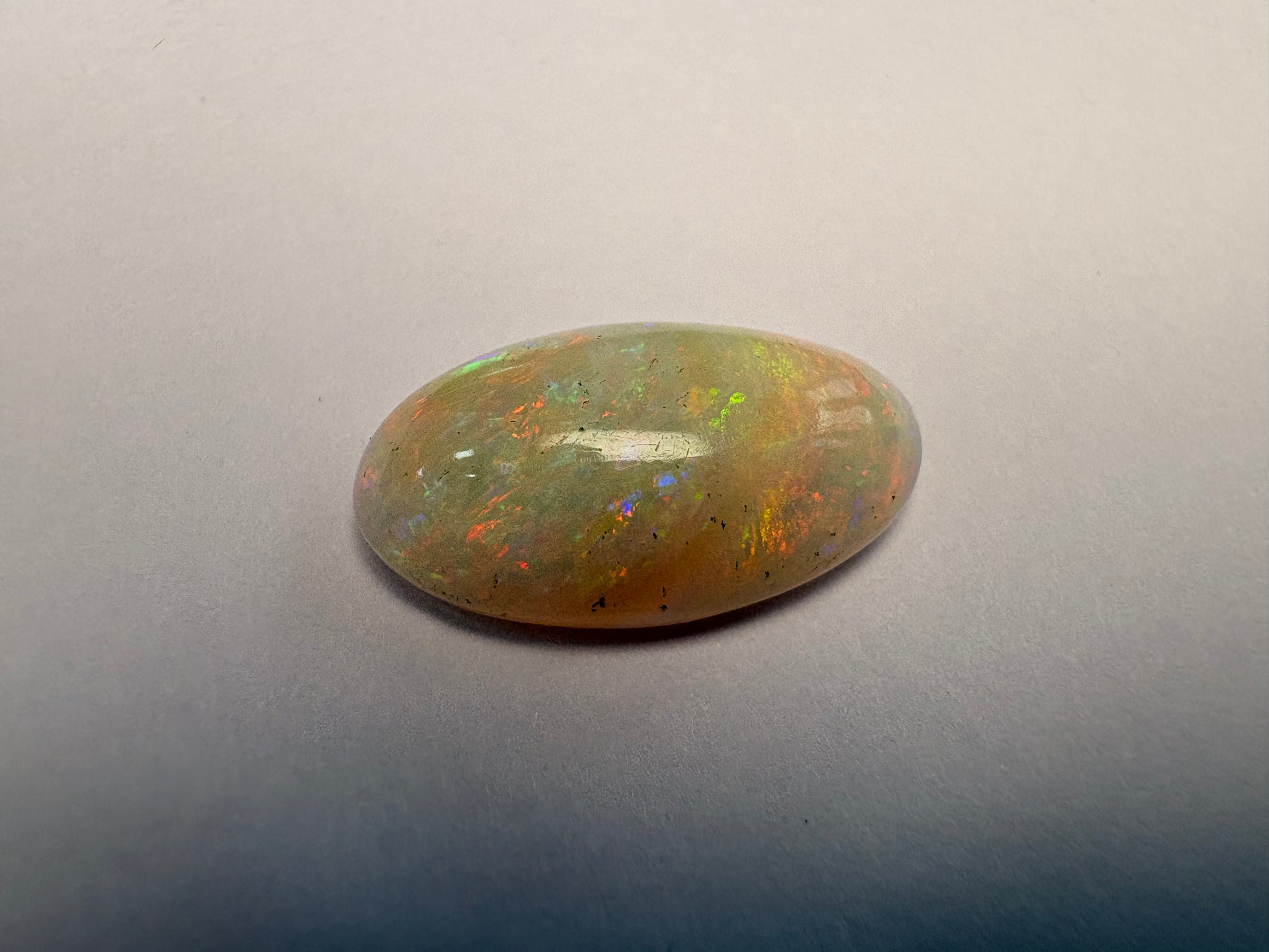 Opal 5.60 carat OPR-37 alternate face-up view