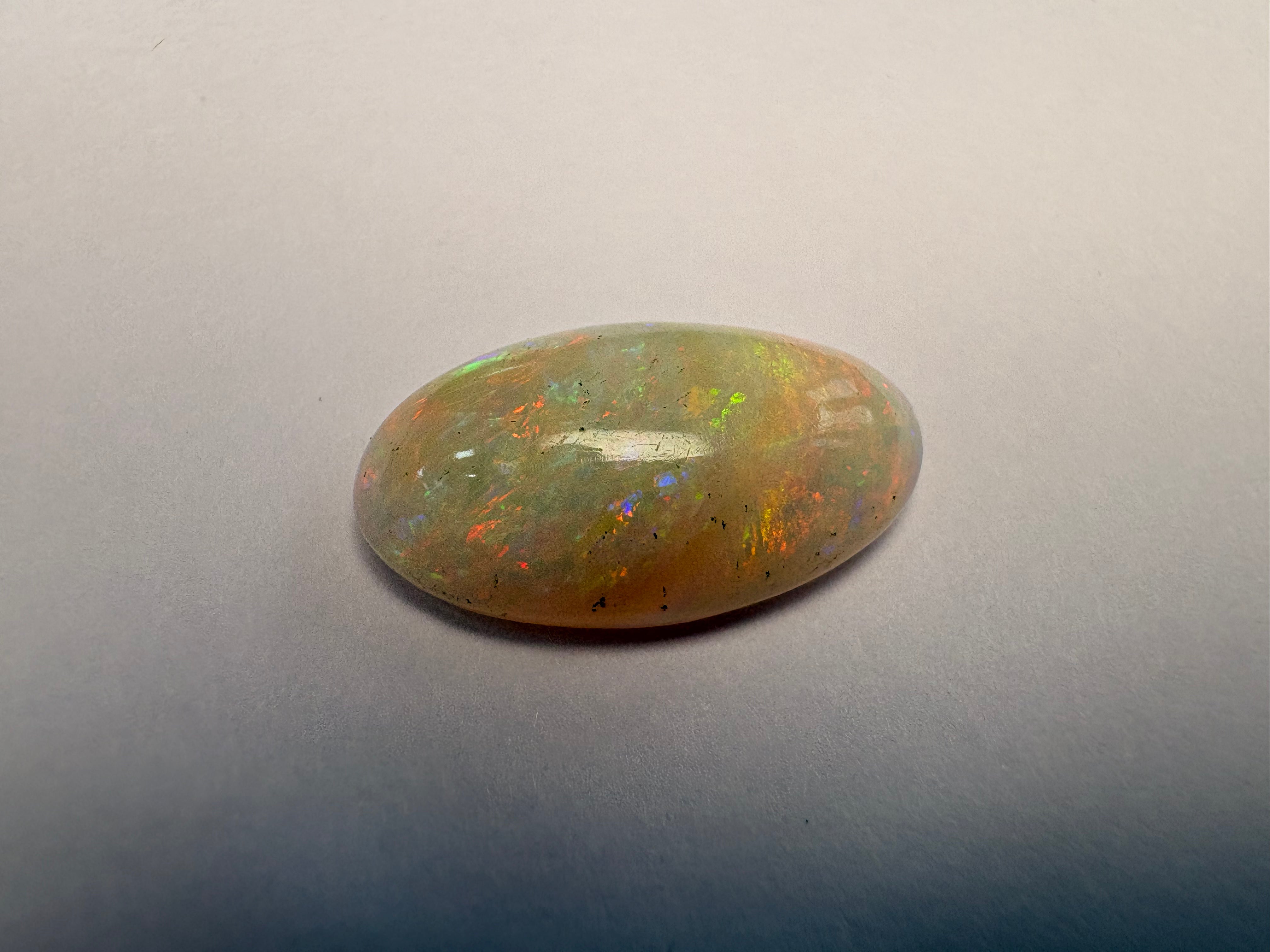 Opal 5.60 carat OPR-37 alternate face-up view