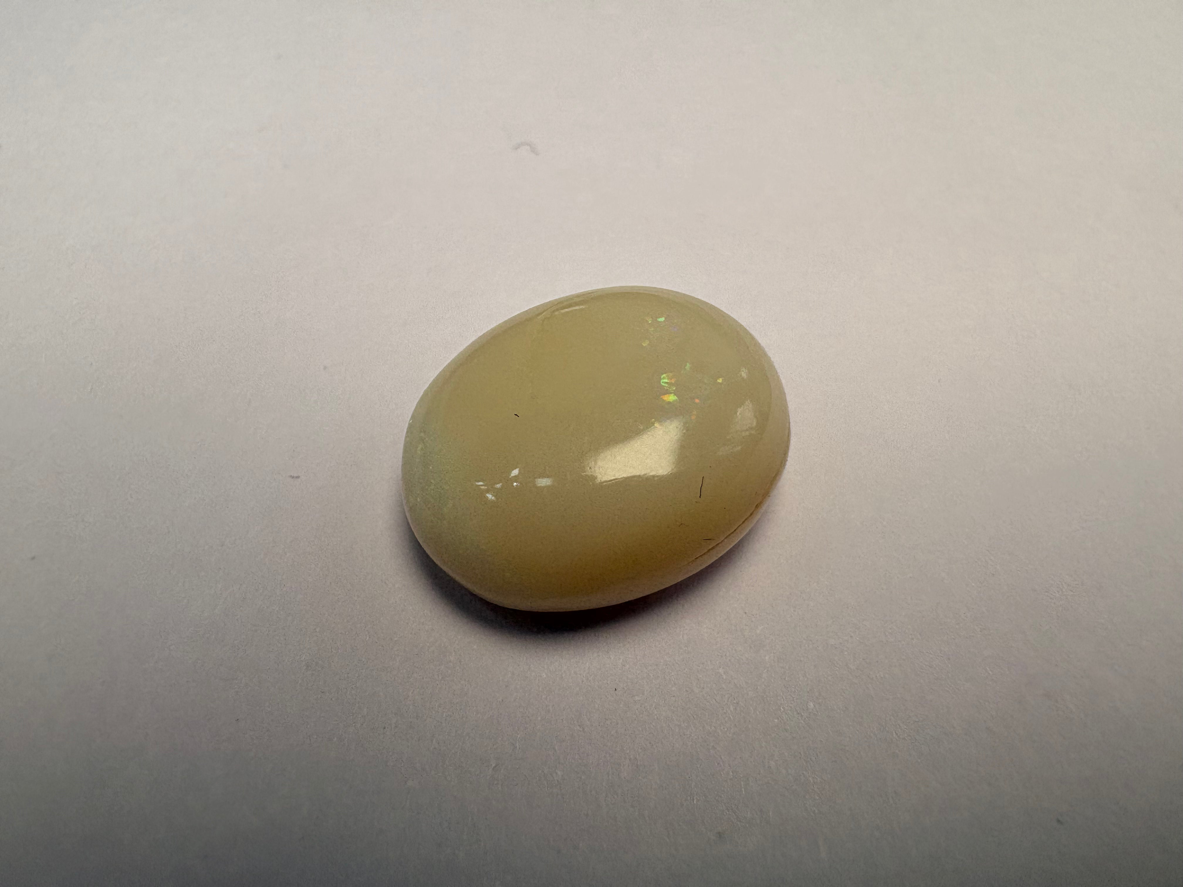 Opal 10.19 carat OPR-5 alternate face-up view