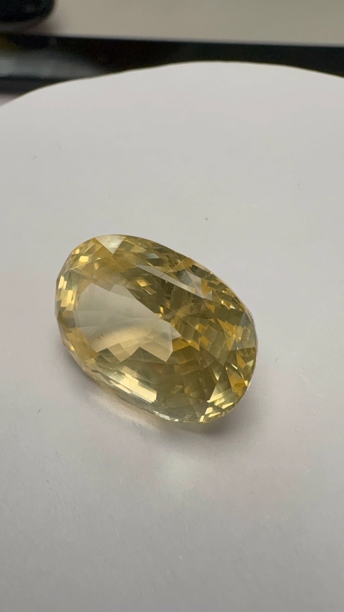 Yellow Sapphire 23.83 carat SYS-23 angled view